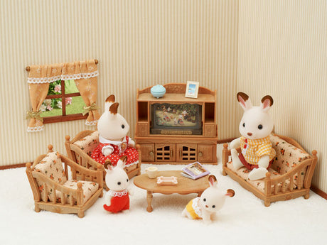 Comfy Living Room set with interchangeable sofa and armchair materials, TV with changeable pictures, and miniature furniture.