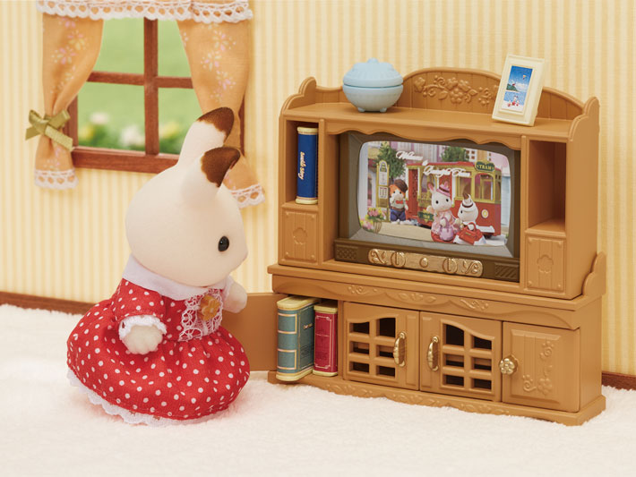 Comfy Living Room set featuring a bunny figure watching TV with interchangeable picture sheets in a cozy setting