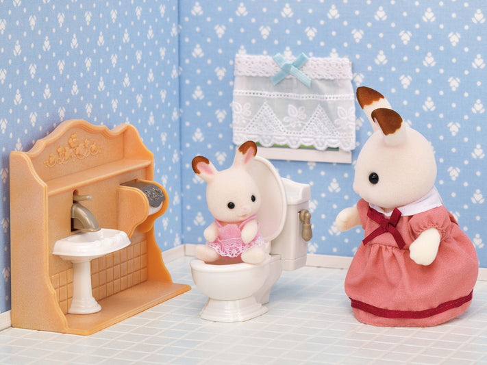 Playful Furniture with poseable rabbit figures in a detailed miniature bathroom setup for creative pretend play.