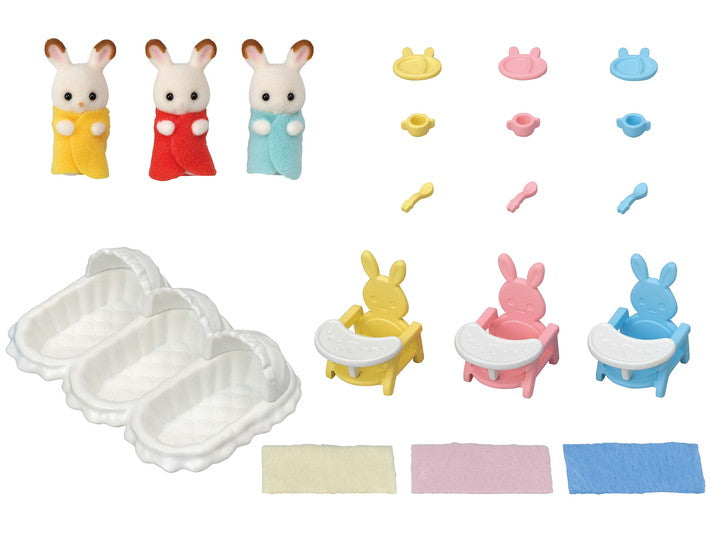 Triplets Care Set with three Hopscotch Rabbit cradled babies, baby chairs, feeding spoons, and cribs for imaginative play.