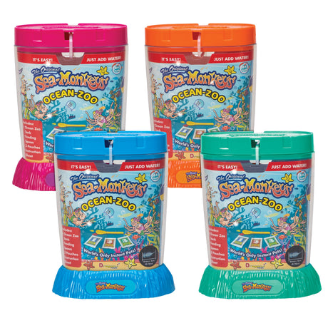 Sea Monkeys kits in assorted colors with aquarium, magnifiers, live eggs, and instructions for growing Sea Monkeys.