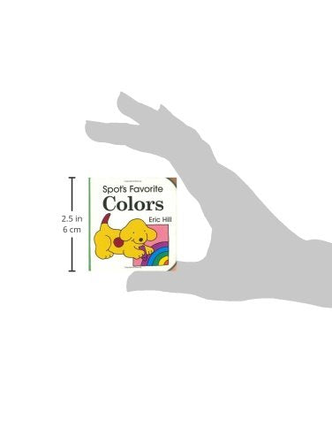 Spot's Favorite Colors book held by hand showing bright cover with Spot the dog and colorful rainbow illustration.
