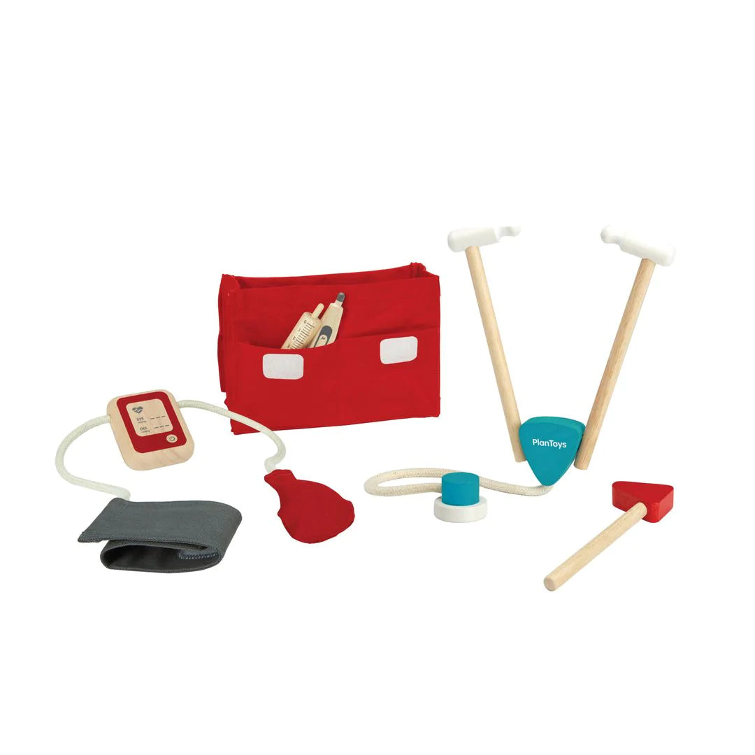 Doctor Set with 5 wooden medical tools and red carrying case for pretend play and early empathy learning.