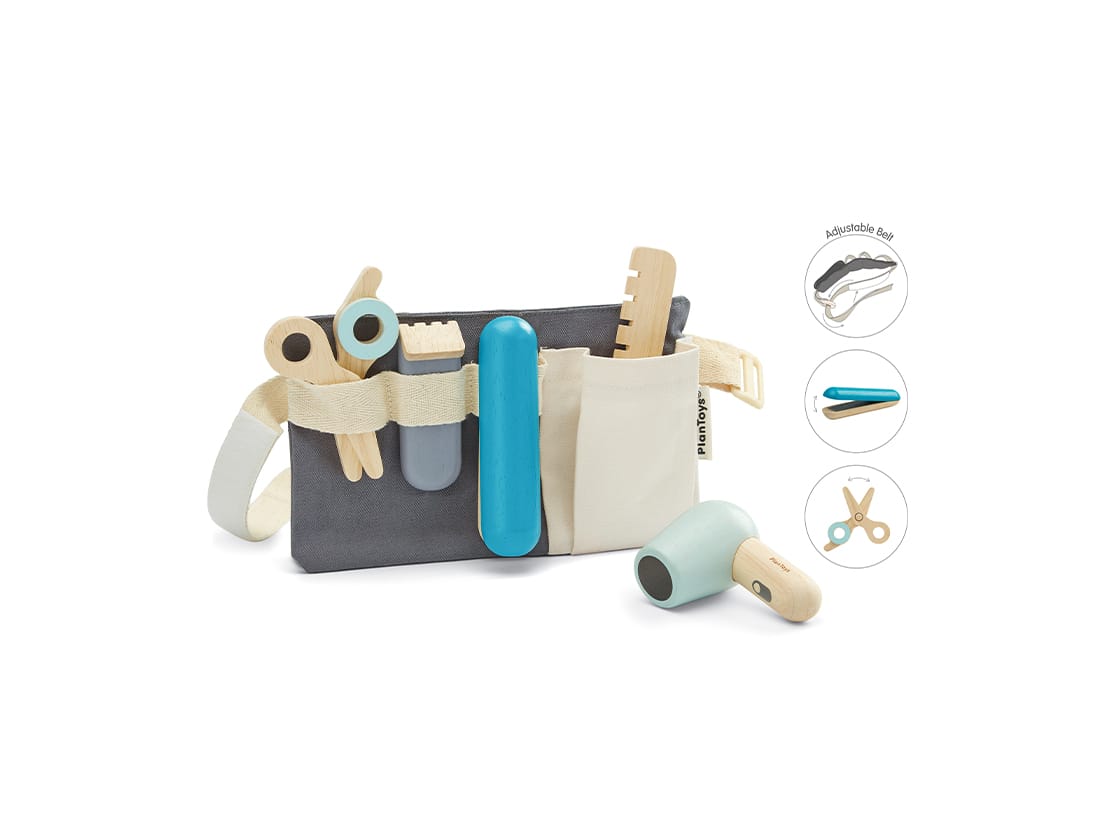 Hair Dresser Set with toy scissors, hair dryer, comb, straightener, and clipper in a fabric utility belt for kids.