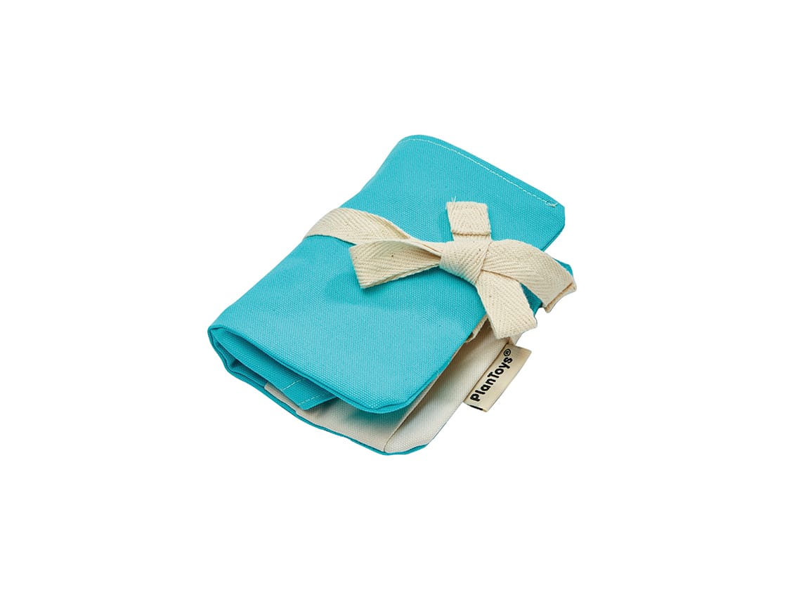 Dentist Set with blue cotton storage bag tied with cream ribbon for wooden dental tools and pretend play teeth.