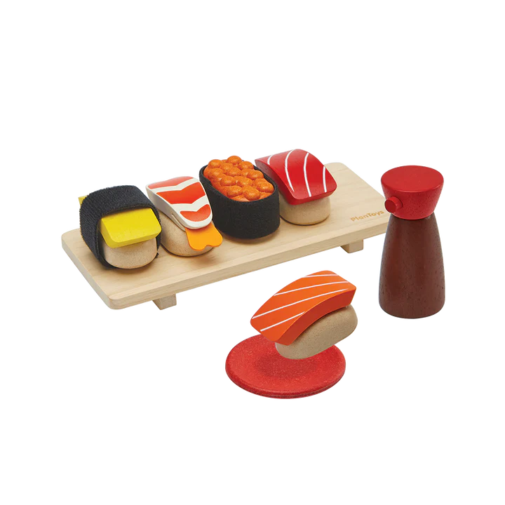 PlanToys Sushi Set with wooden sushi pieces, tray, shoyu bottle, and sauce dish for pretend play.