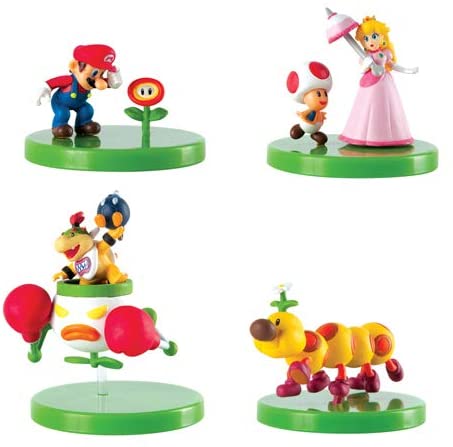 Super Mario Buildable Figure showing Mario, Princess Peach with Toad, Bowser Jr, and Wiggler on display stands.