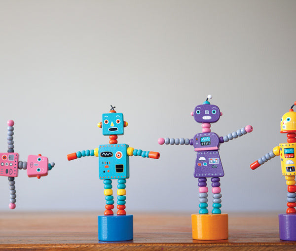 ThumbToy Robot push puppets in assorted colors, extra large and fun, standing on wooden bases with arms outstretched.
