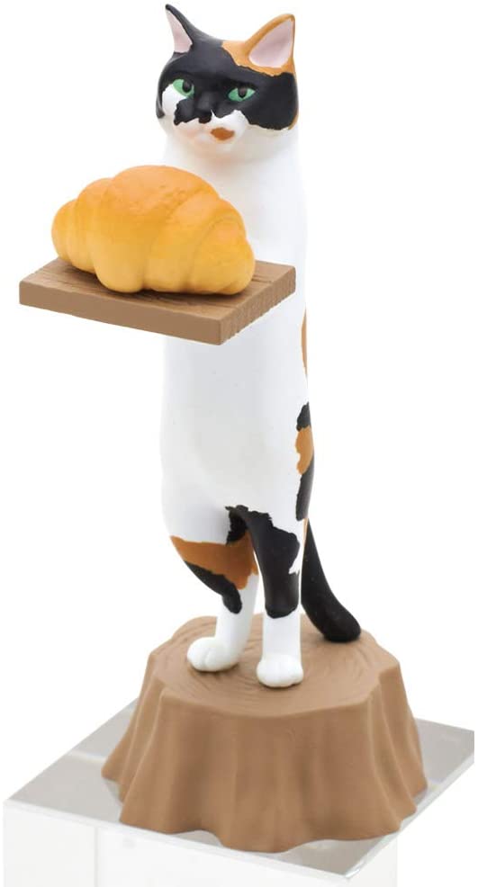 Calico cat figurine holding a croissant on a tray, standing on a draped pedestal for Cat Bakery Blind Box.