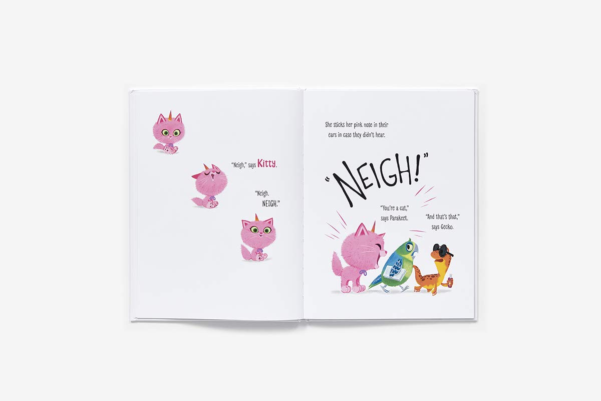 Open book showing colorful illustrations of a pink cat and friends with "Itty Bitty Kitty Corn" text.