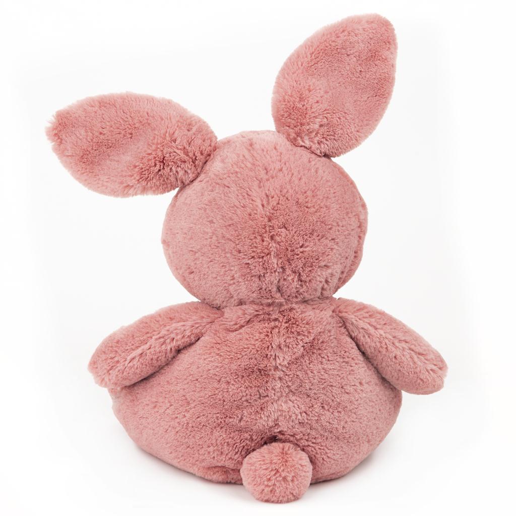 Oh So Snuggly Bunny plush toy in pastel pink, ultra-soft with floppy ears and a cuddly textured body.
