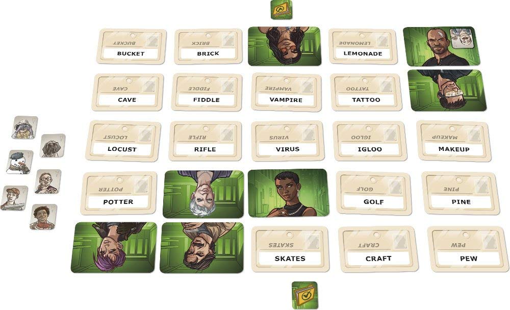 Codenames: Duet board game setup with word cards, agent cards, and key card for cooperative spy-themed gameplay.