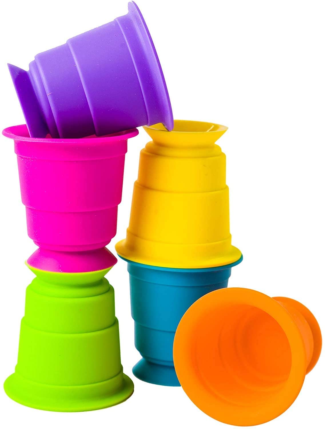 Suction Kupz colorful silicone cups stacked and rolled, perfect for creative play and safe for kids to sip and stick.