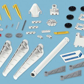 Wind Power kit components including blades, rotor parts, and connectors for assembling a realistic wind turbine model.