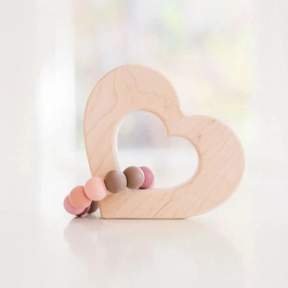 Heart Grasping Toy made of smooth maple wood with colorful silicone beads for baby’s grip and sensory play.
