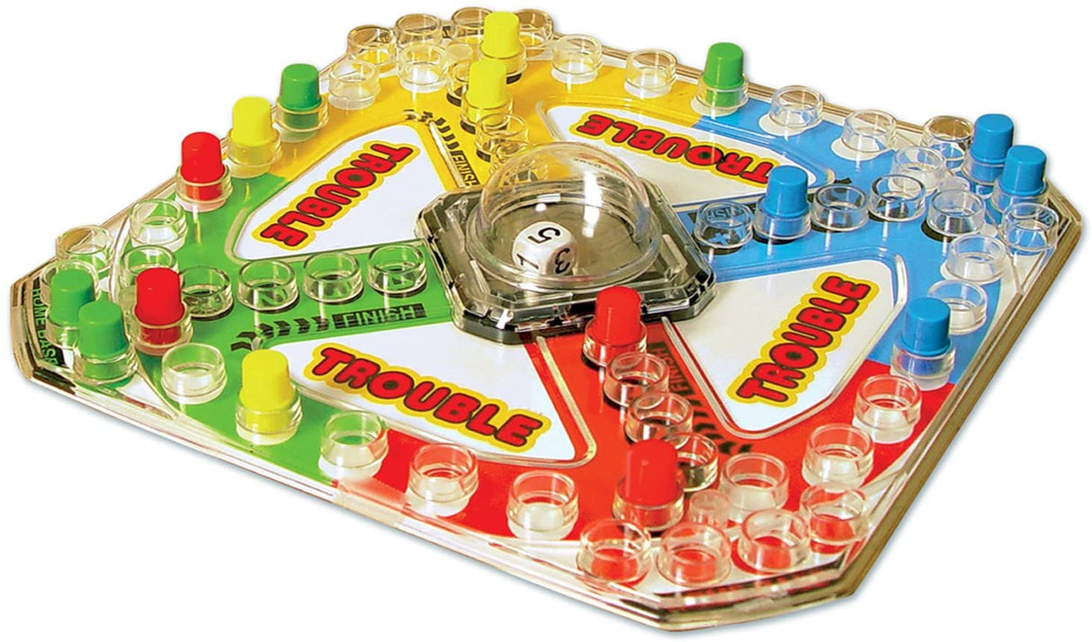 Trouble board game with colorful pegs and Pop-O-Matic roller for family fun in the classic Trouble game.