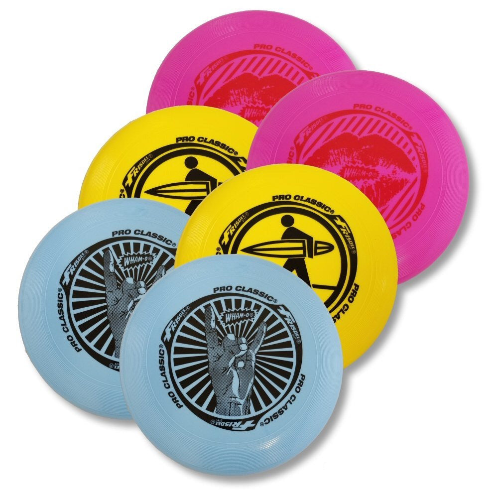 Colorful Frisbee Pro Classic discs with bold black artwork, perfect for outdoor play at the beach or park.