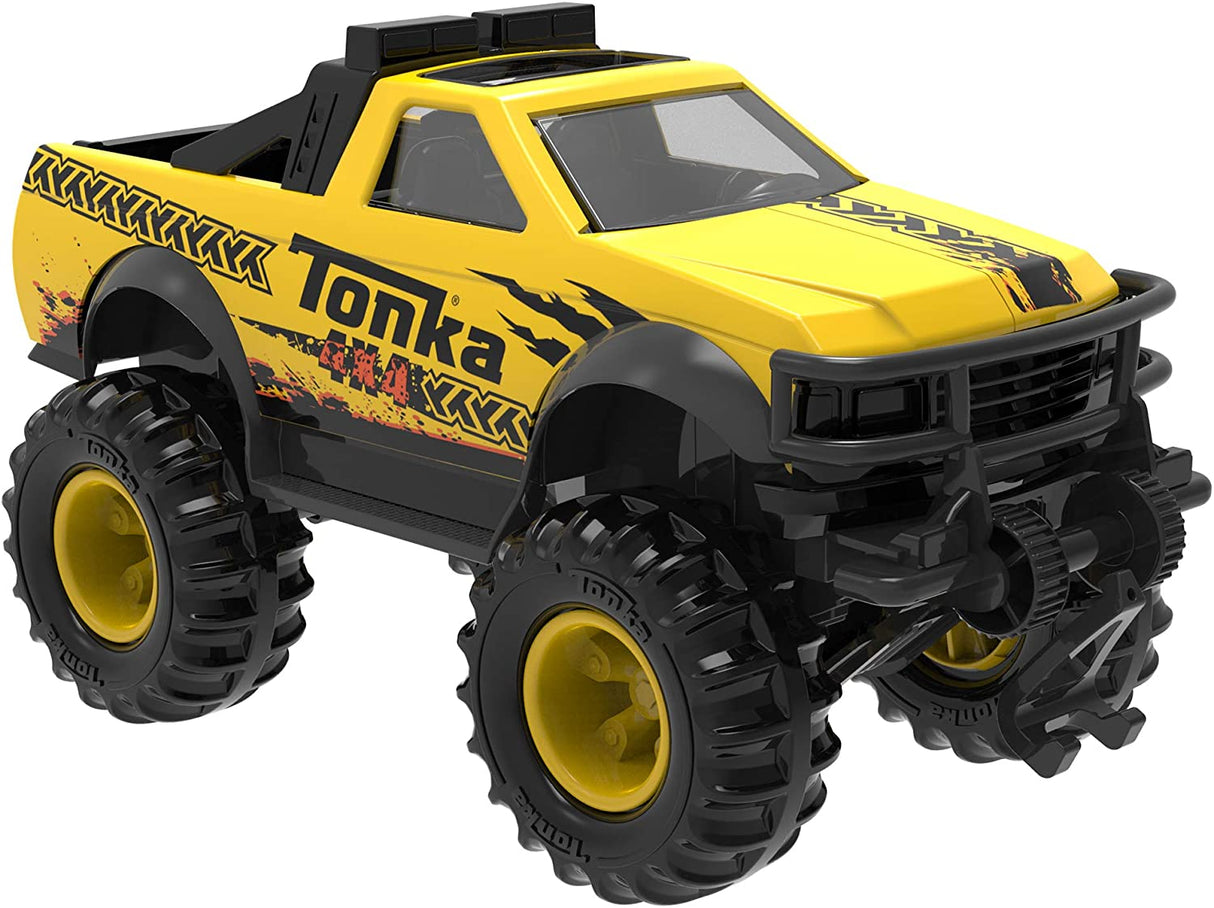 Tonka 4x4 Pickup Truck in yellow with large off-road tires, rugged design, and detailed pickup bed for outdoor play.
