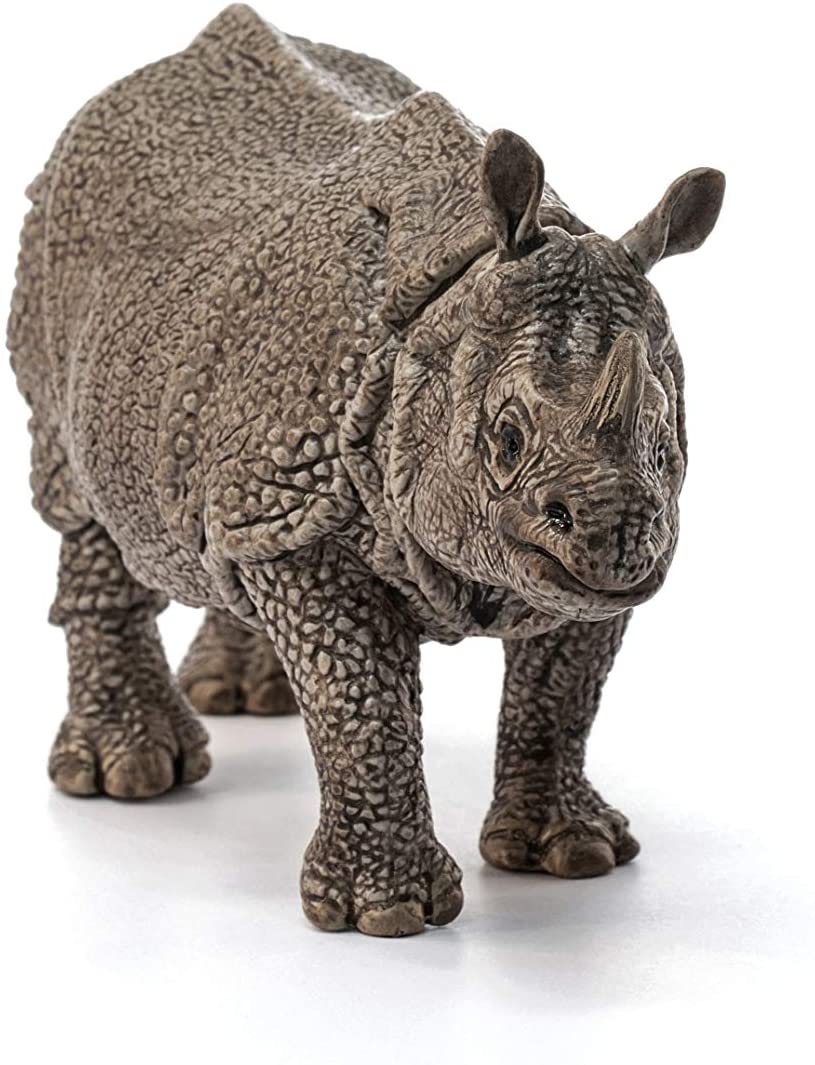 Rhinoceros figurine with detailed thick skin folds resembling Indian rhinoceros in a calm and peaceful stance.