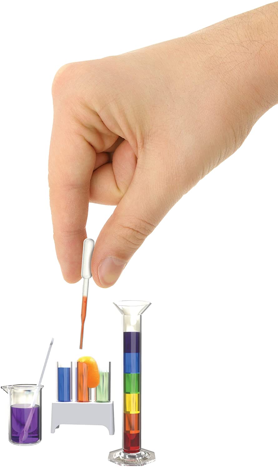 Hand holding pipette above colorful liquids in tiny test tubes and graduated cylinder for Tiny Tools Tiny Science kit.
