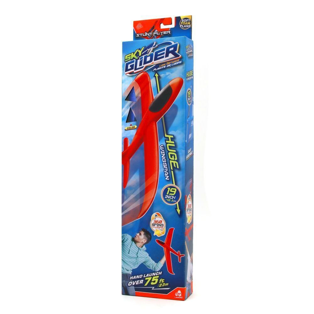 Sky Glider hand throwing foam glider toy in red with packaging showing a boy launching it outdoors.
