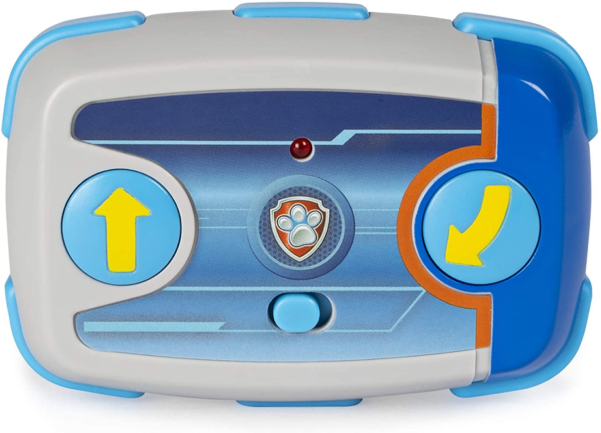 RC Paw Patrol Chase Police Cruiser blue and gray remote control with two buttons and Paw Patrol badge in center.