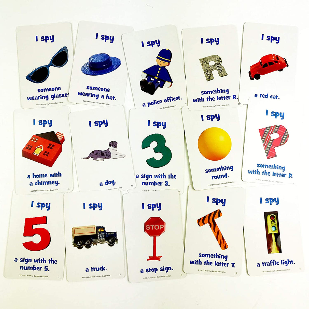 I Spy Travel! Card Game featuring colorful scavenger hunt cards with objects for kids to find on road trips.