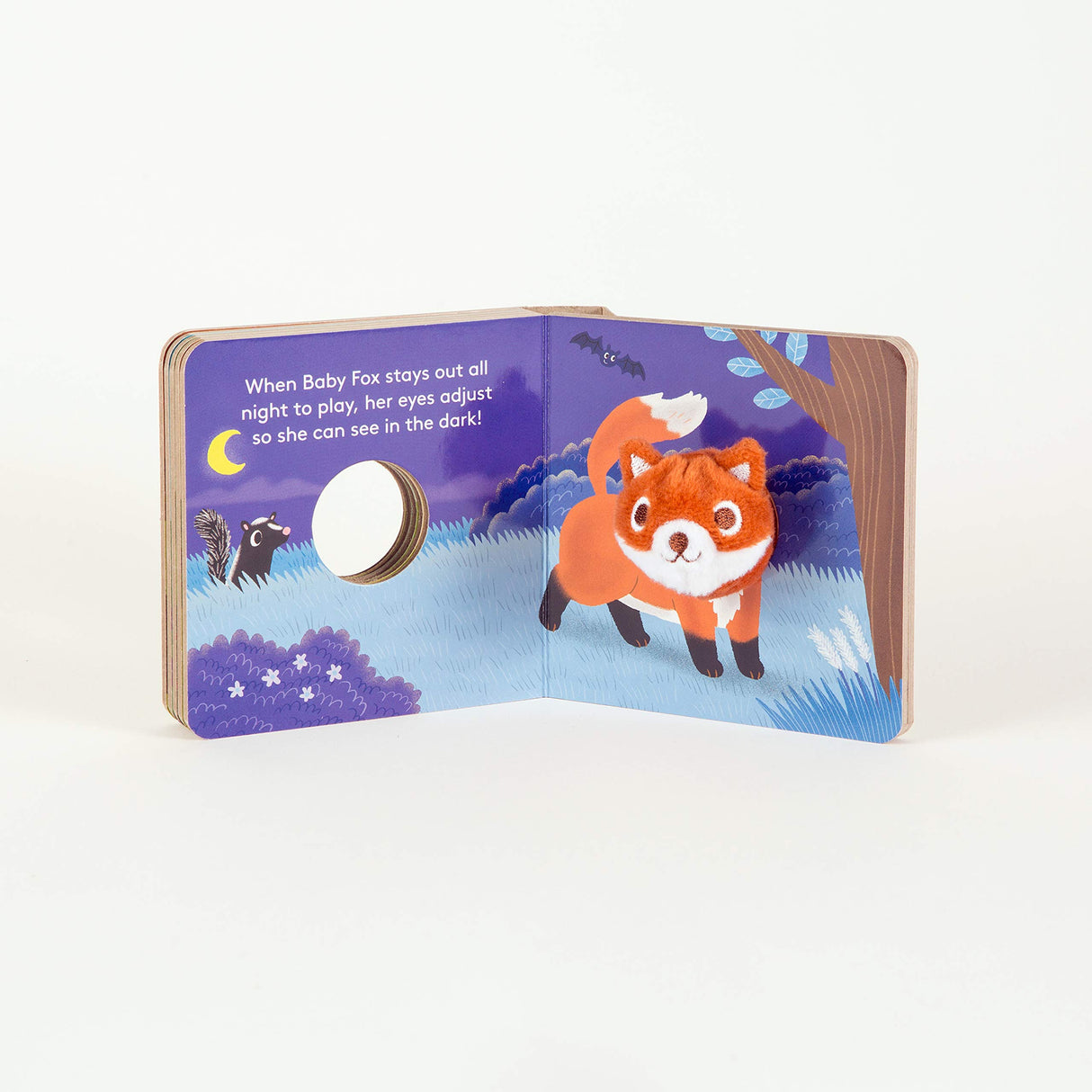 Baby Fox with Finger Puppet board book open showing a baby fox illustration and a cutout finger puppet hole.