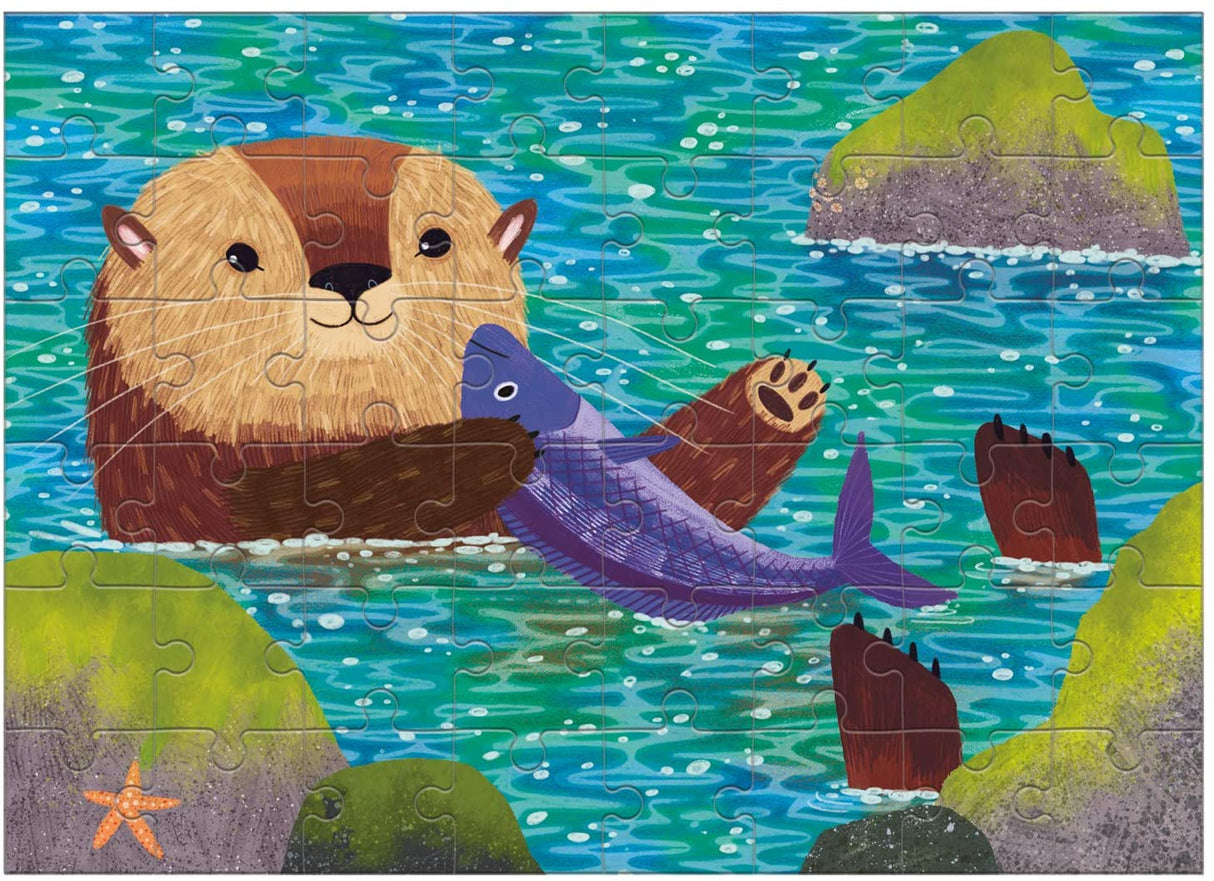 48pc Sea Otter Mini Puzzle showing a cute sea otter holding a fish in colorful water with rocks and a starfish.