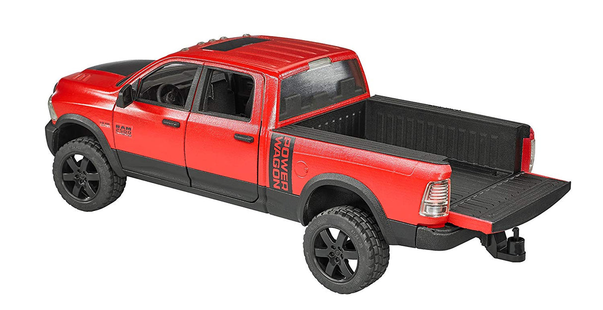 Red Ram 2500 Power Wagon toy truck with crew cab, open doors, tailgate, and detailed off-road features.