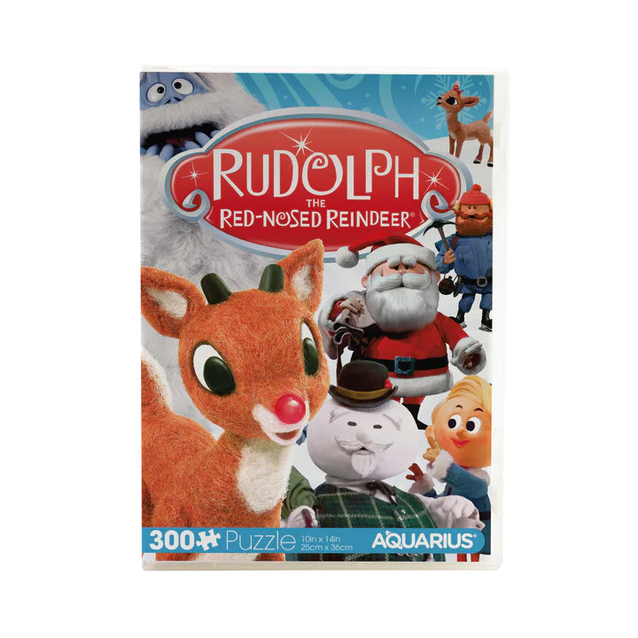 300pc Rudolph VHS Puzzle featuring classic Rudolph the Red-Nosed Reindeer cover in vibrant colors and festive characters.