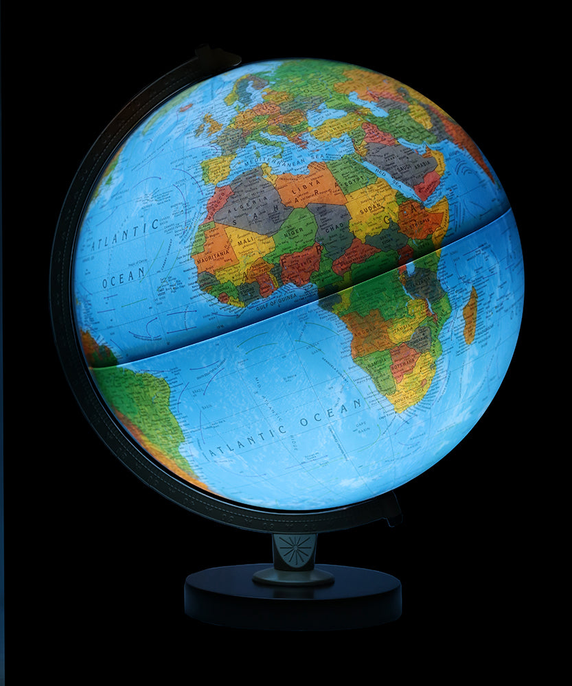 Livingston Light-Up Globe showing illuminated political map of Africa and surrounding oceans on a black background