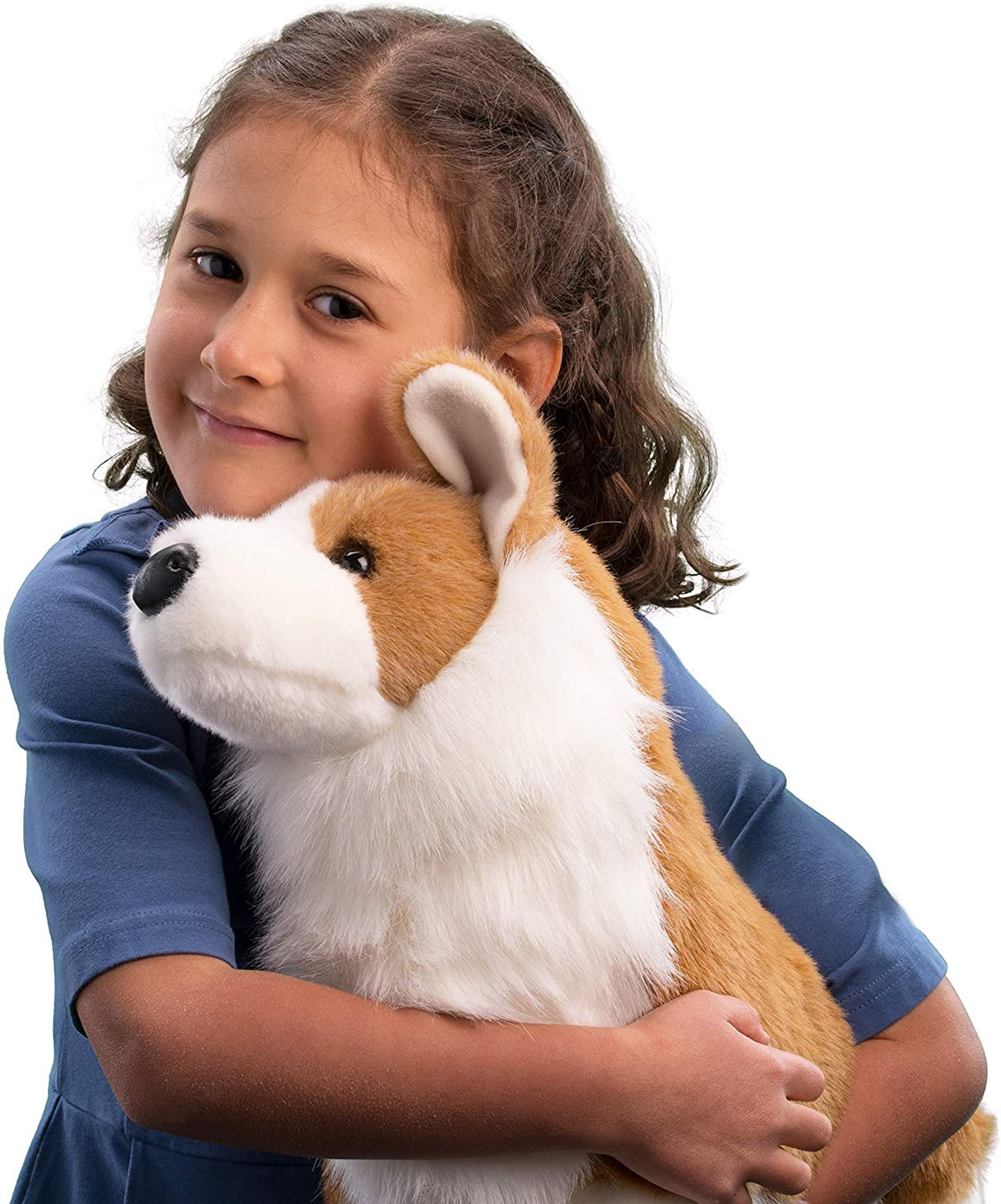 Young girl hugging a lifelike plush dog with russet and white fur named Corgi Chadwick.