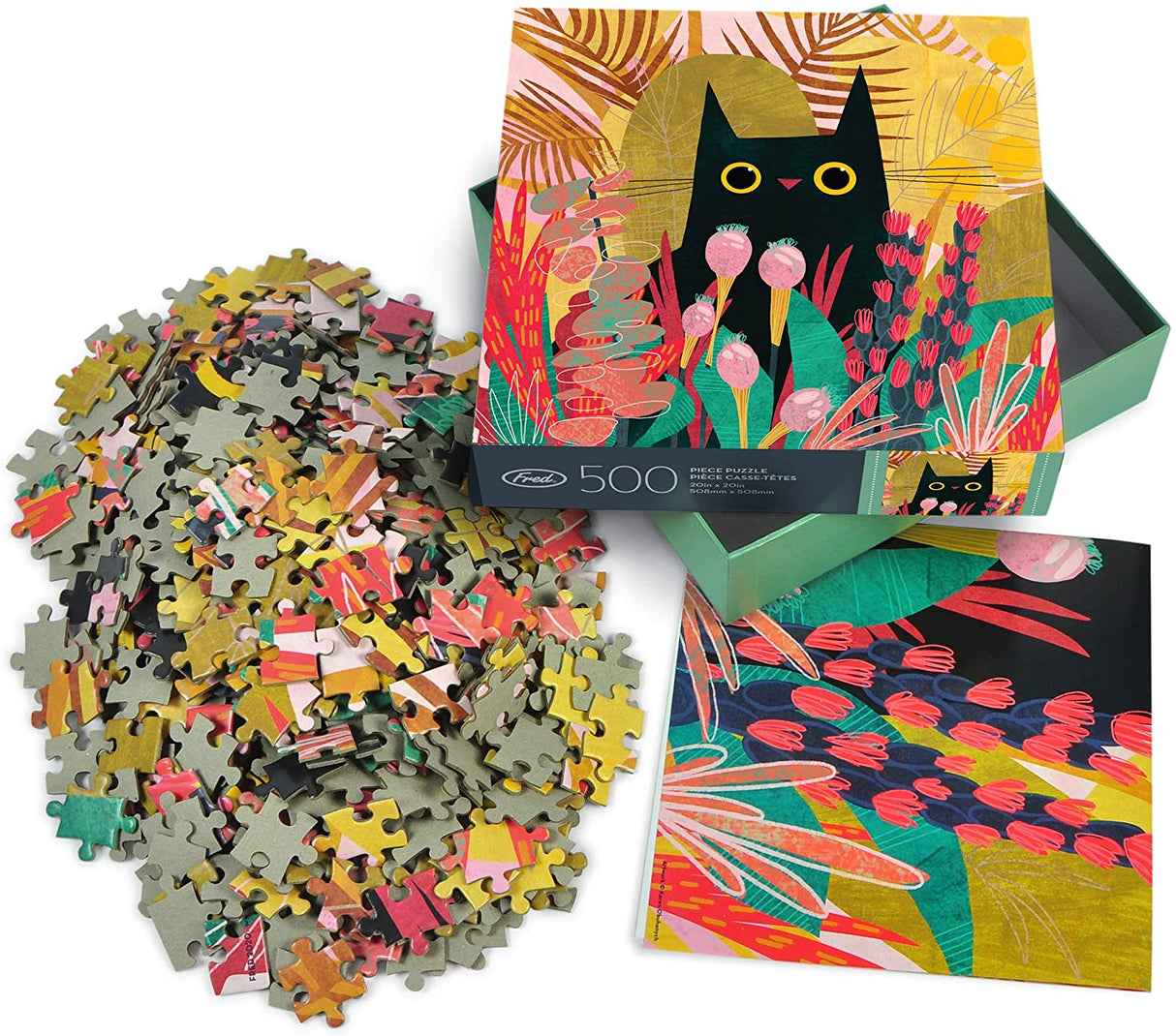 500pc Black Cat Puzzle with scattered colorful pieces and vibrant cat and garden illustration on box and reference sheet.