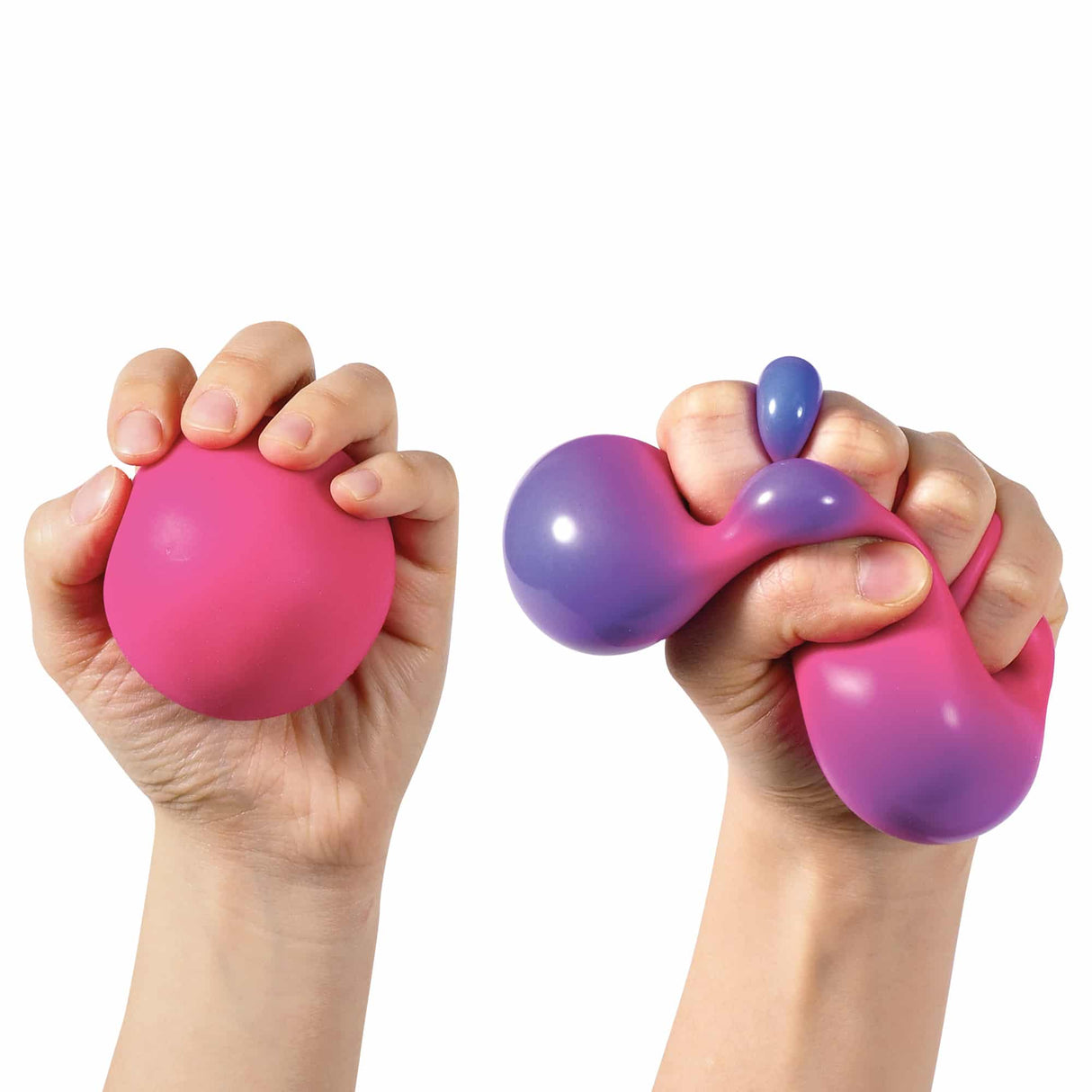 Hands squeezing and stretching a pink and purple Color Change NeeDoh fidget toy ball for stress relief and focus.