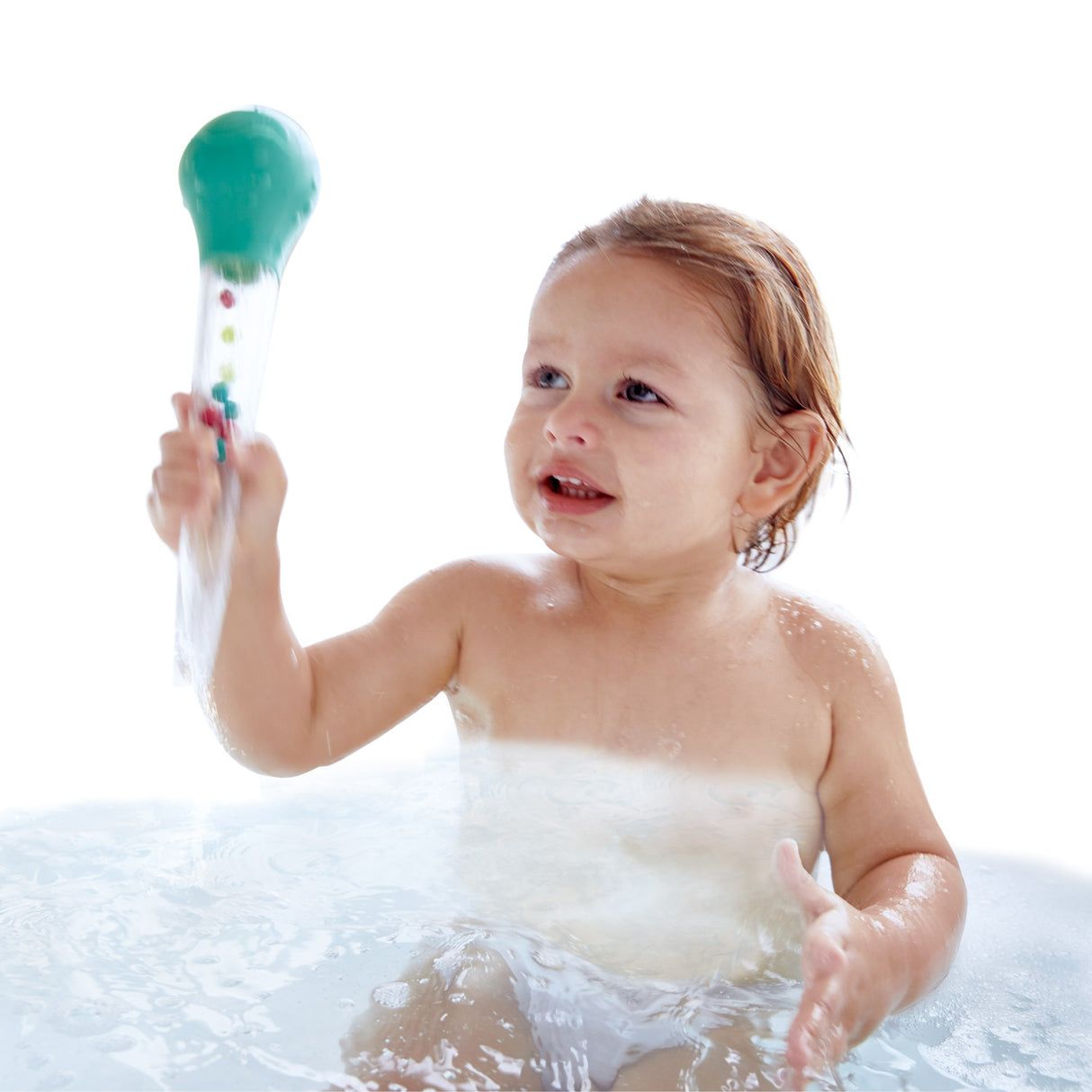 Child playing in bath with colorful Squeeze & Squirt water toy, enjoying fun and learning during bath time.