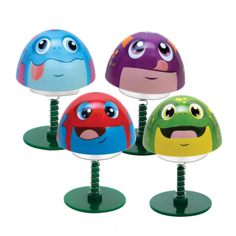 Four colorful Frog Popper tin toys with spring bases and cheerful faces in assorted colors.