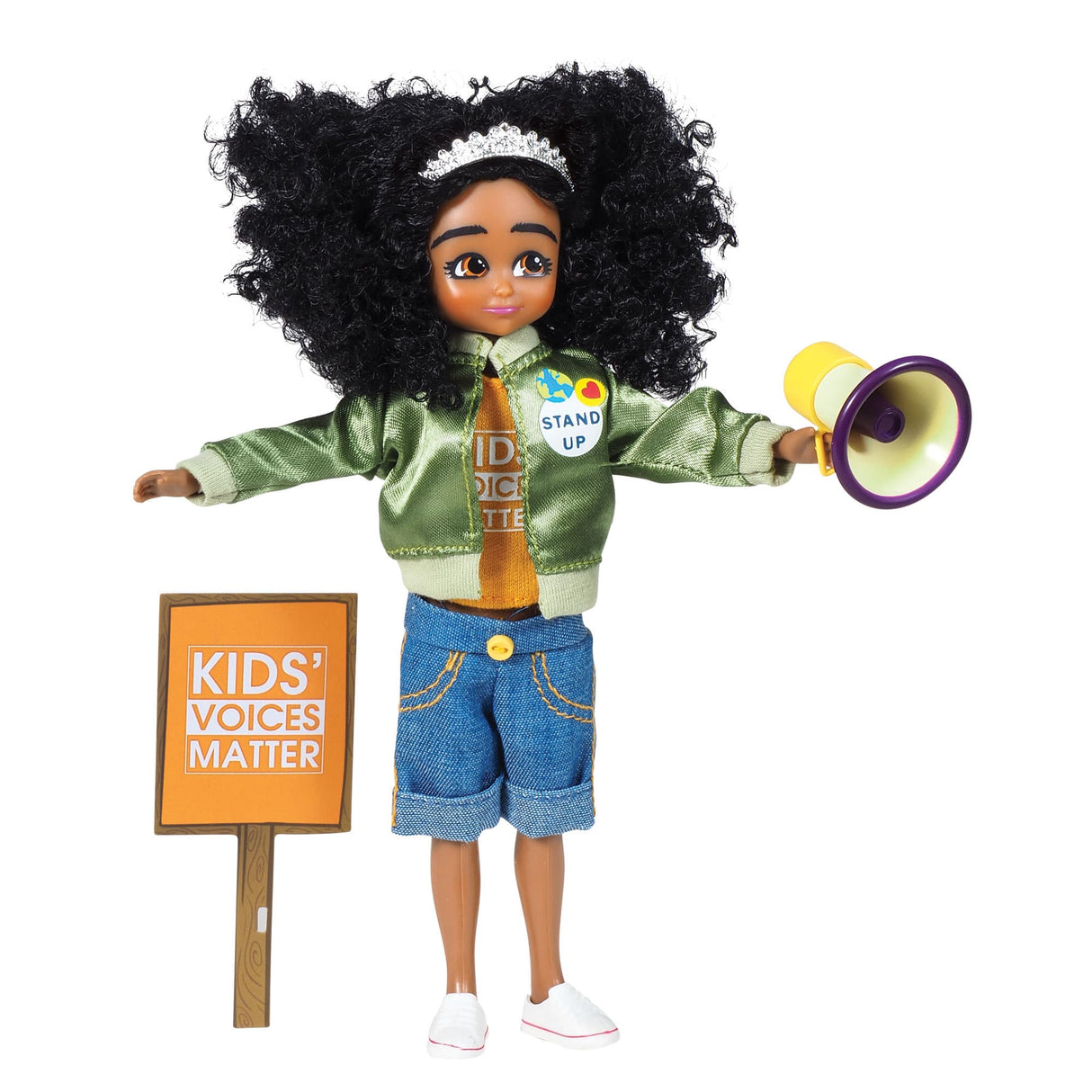 Lottie Kid Activist doll with curly hair, green bomber jacket, denim shorts, megaphone, and Kids Voices Matter sign.