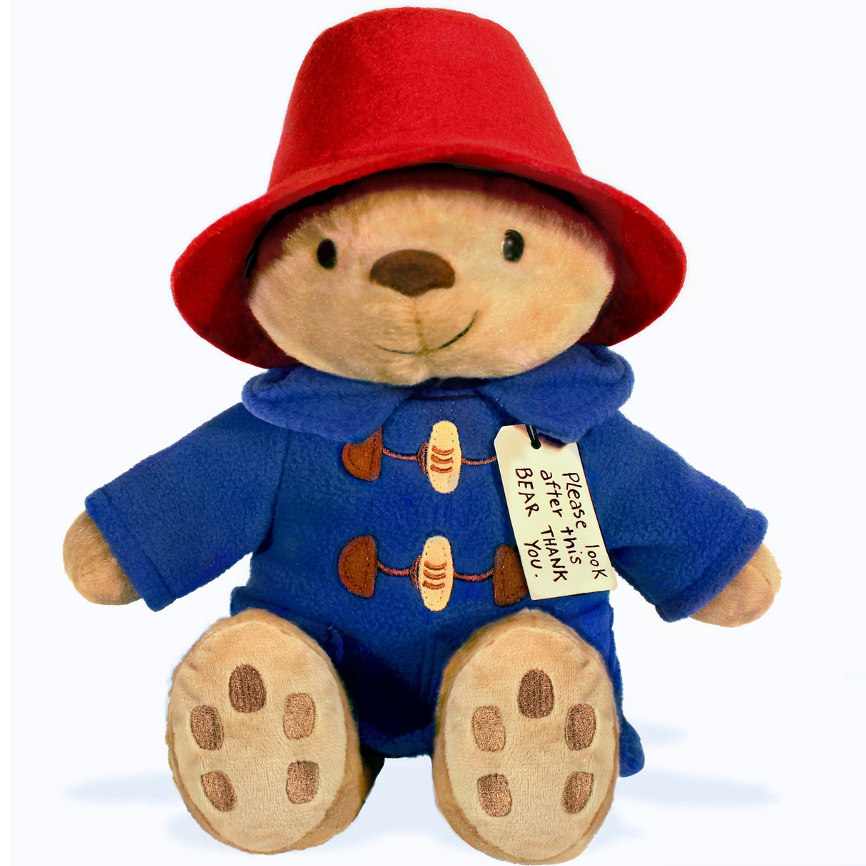 Paddington plush bear wearing blue fleece coat, red hat, with open arms and "Please look after this Bear" tag.