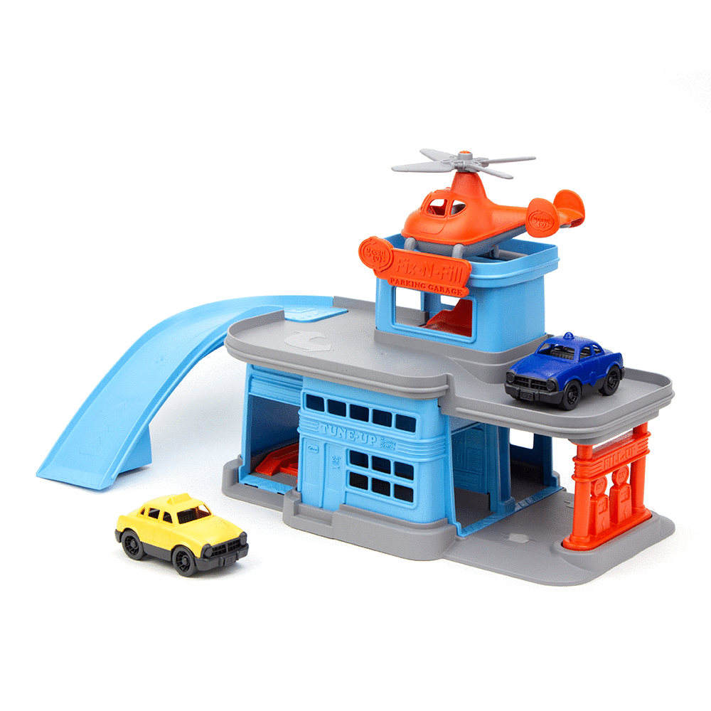 Green Toys Parking Garage with ramp, elevator, helipad, mini helicopter, and two mini vehicles for imaginative play.