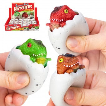 Squeezy Peek Hatcher Dino showing colorful mini dinosaurs popping from cracked eggs held in hands, sold individually.
