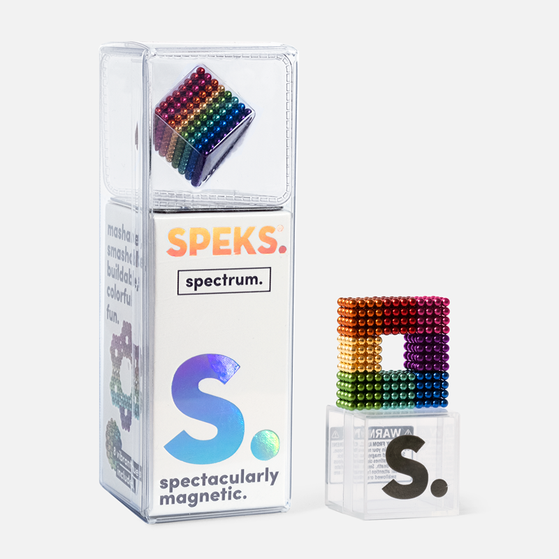 Speks. Spectrum. magnetic balls arranged in a colorful cube with clear packaging on a white background.