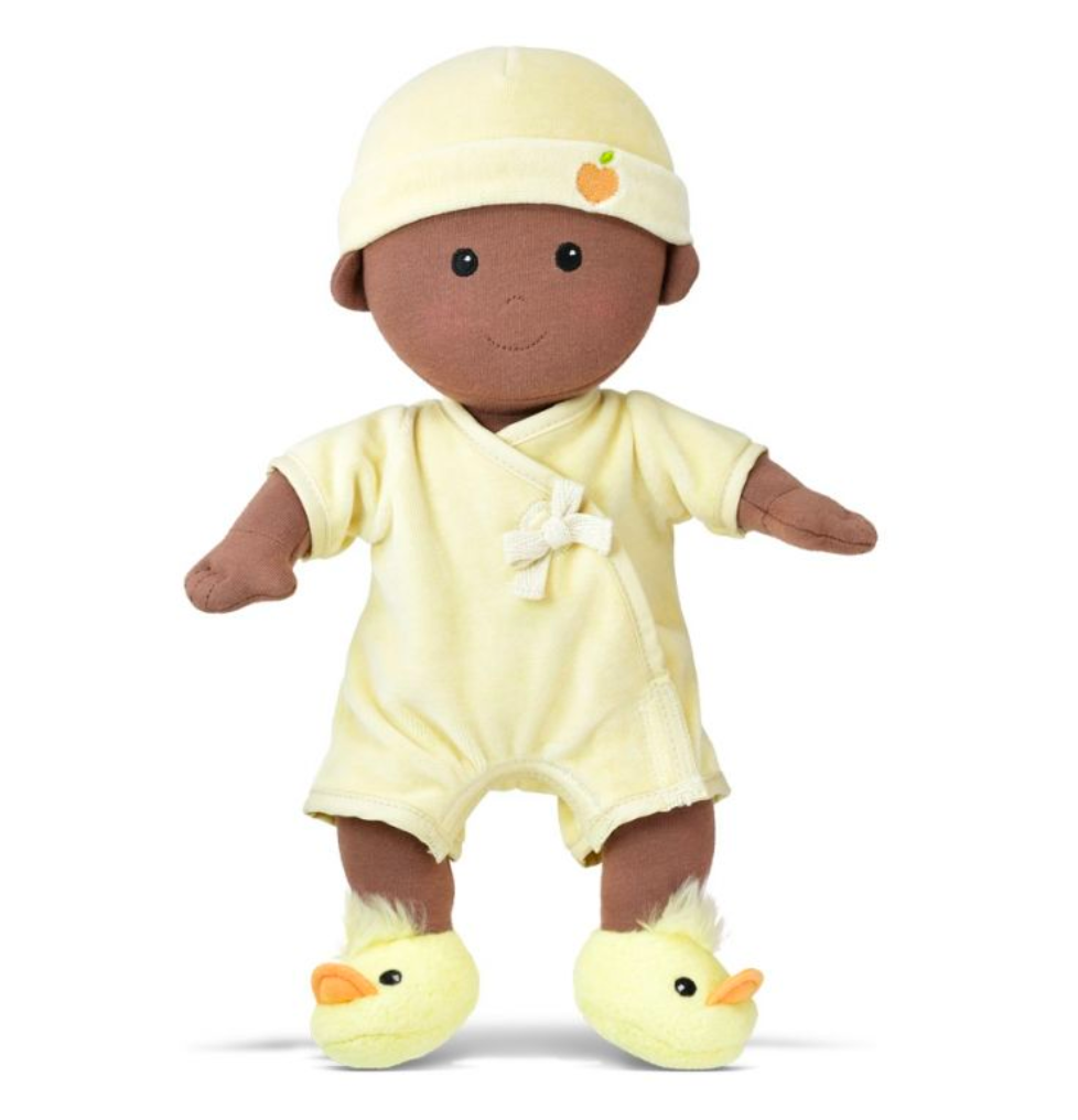 Organic Baby in Yellow plush doll wearing removable yellow onesie, diaper, hat with applique, and ducky booties.