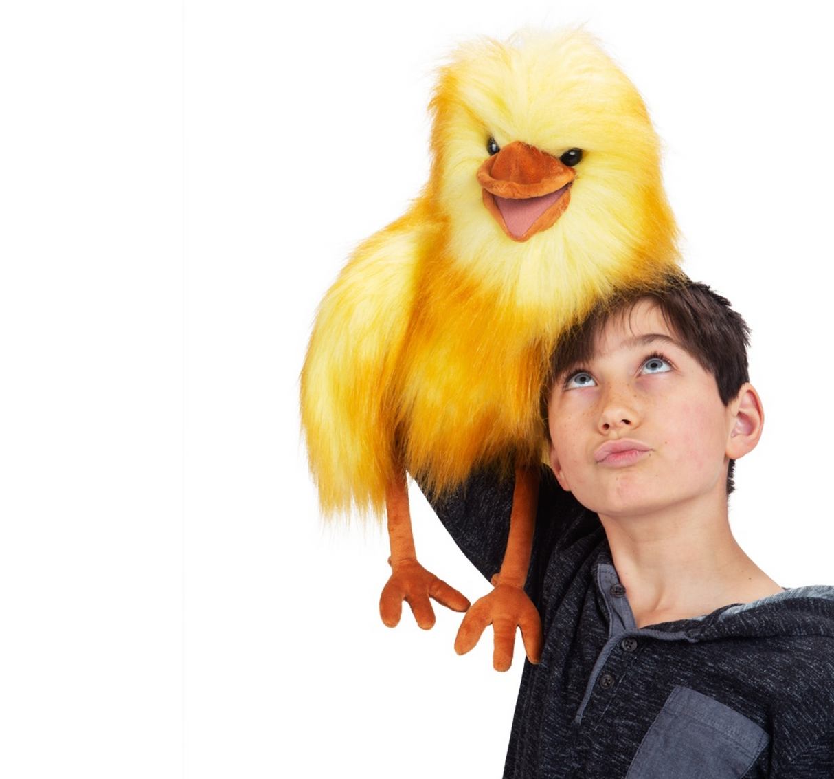Child holding a bright yellow plush Funny Bird Puppet with fluffy feathers and animated beak.