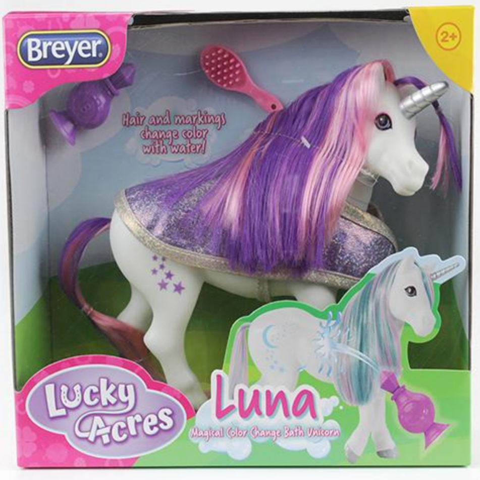 Luna Color Change Unicorn in packaging with purple mane, brush, bathrobe, and color-changing hair and markings bath toy.