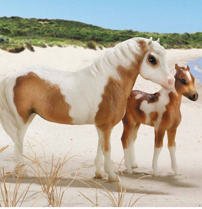 Misty & Stormy with Book shows detailed 1:9 scale mare and foal figures from Misty of Chincoteague story.