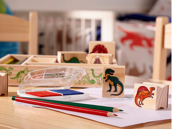 Stamps Dinosaurs Set with 8 dinosaur stamps, two-color ink pad, and colored pencils in a wooden storage box.