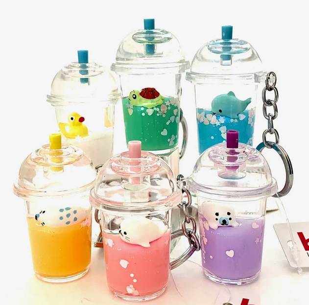 Sea Life Drink Keychain featuring assorted cute animal figures in colorful drink cups keychains sold individually.