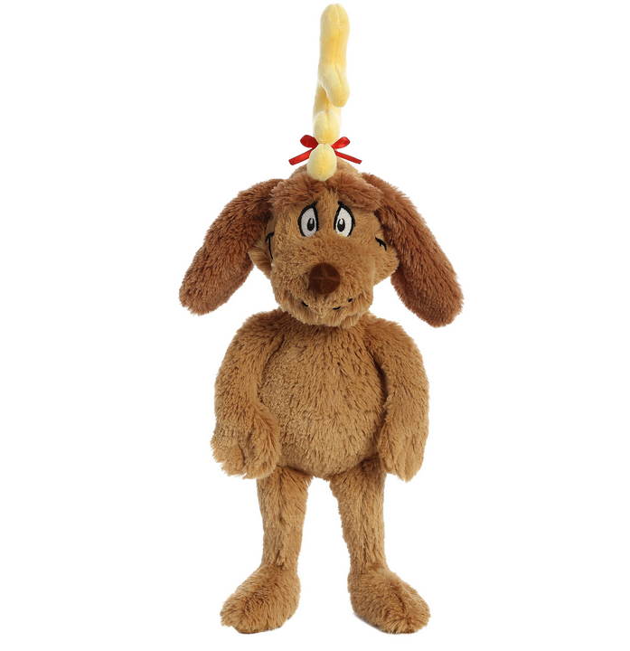Grinch's Dog Max plush with soft brown fur, long ears, and a yellow antler on its head hanging on display.