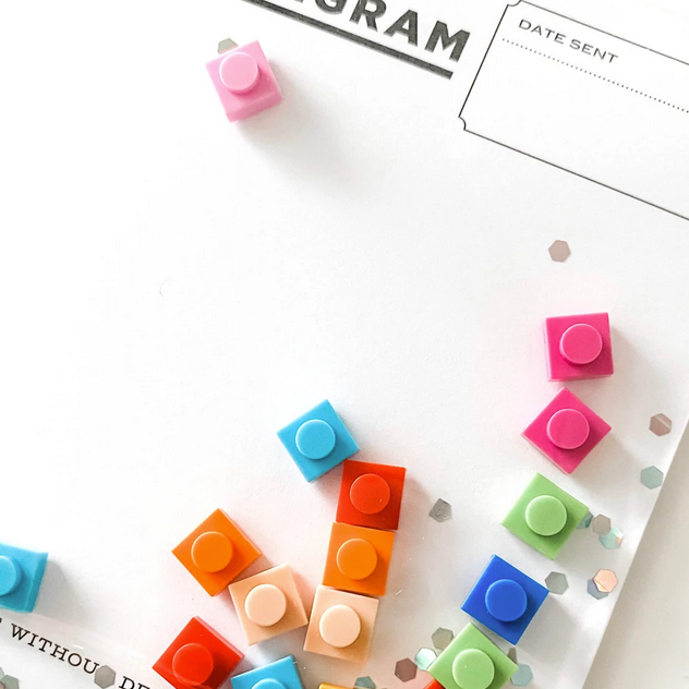 Bricks Confettigram Card with colorful resin confetti pieces on a clear envelope for a unique, playful message.